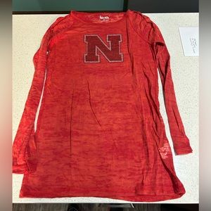 Nebraska woman’s bedazzled long sleeve t shirt